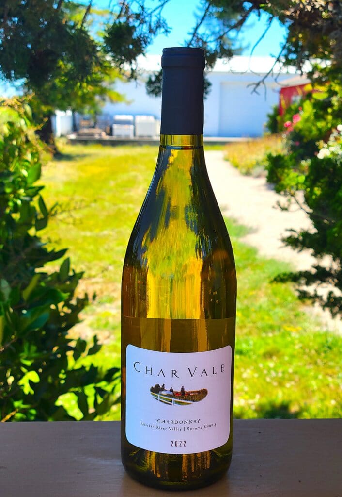 Chardonnay wine bottle outside in sunlight